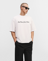 White oversized t-shirt "Bad choices, good stories"