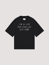Black oversized t-shirt "I’m so sexy that even life gets hard"
