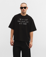 Black oversized t-shirt "I’m so sexy that even life gets hard"