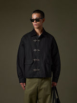 Black jacket with metal closures