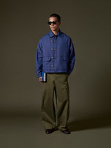 Dark blue jacket with metal closures