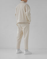 Короткі бежеві бавовняні штани