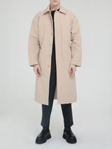 Le manteau trench beige classique