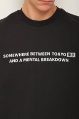 Black oversized t-shirt "Somewhere between"