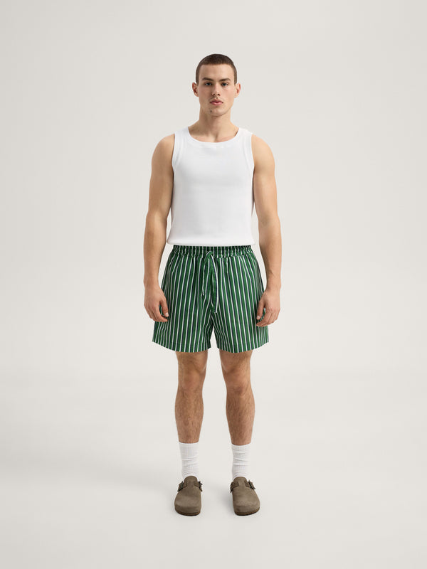 Green-striped pajama shorts