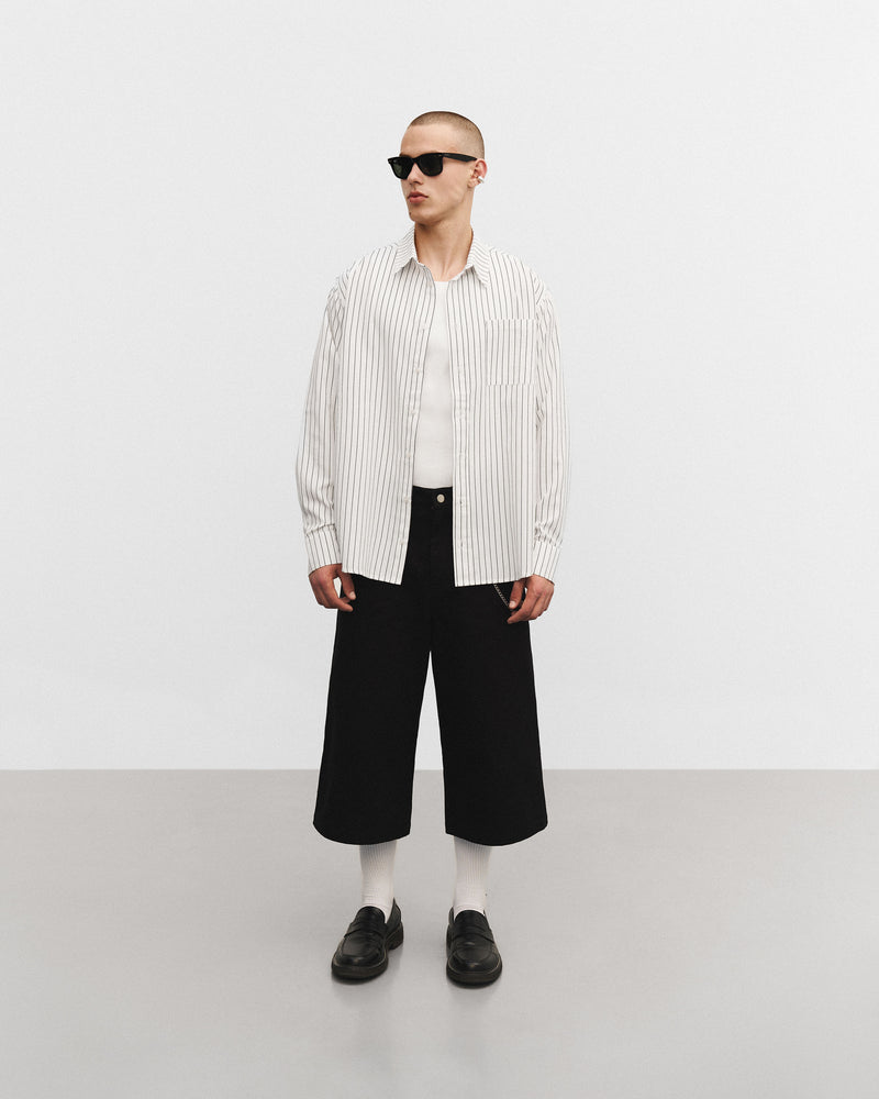 La chemise à manches longues en n&b