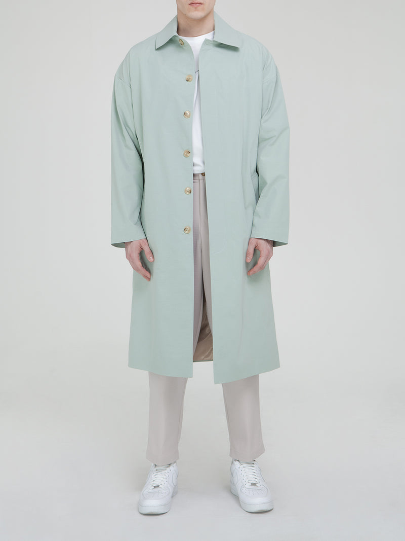 Le manteau trench vert classique